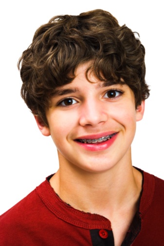 curly haired boy with braces